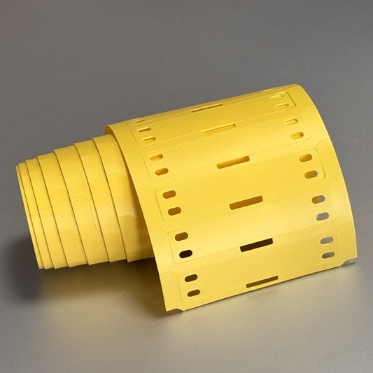 Yellow PUR Cable Markers on a grey background