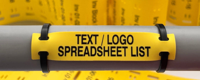 Yellow label with text 'TEXT / LOGO SPREADSHEET LIST' attached to a cable by www.cablelabels.uk